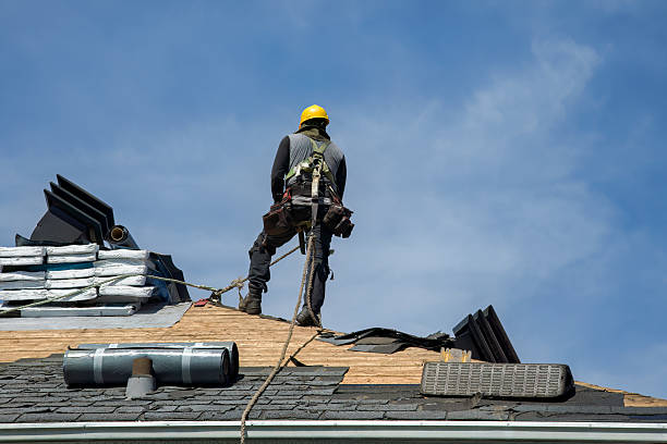 Professional Roof Replacement technician working in Medford, OK